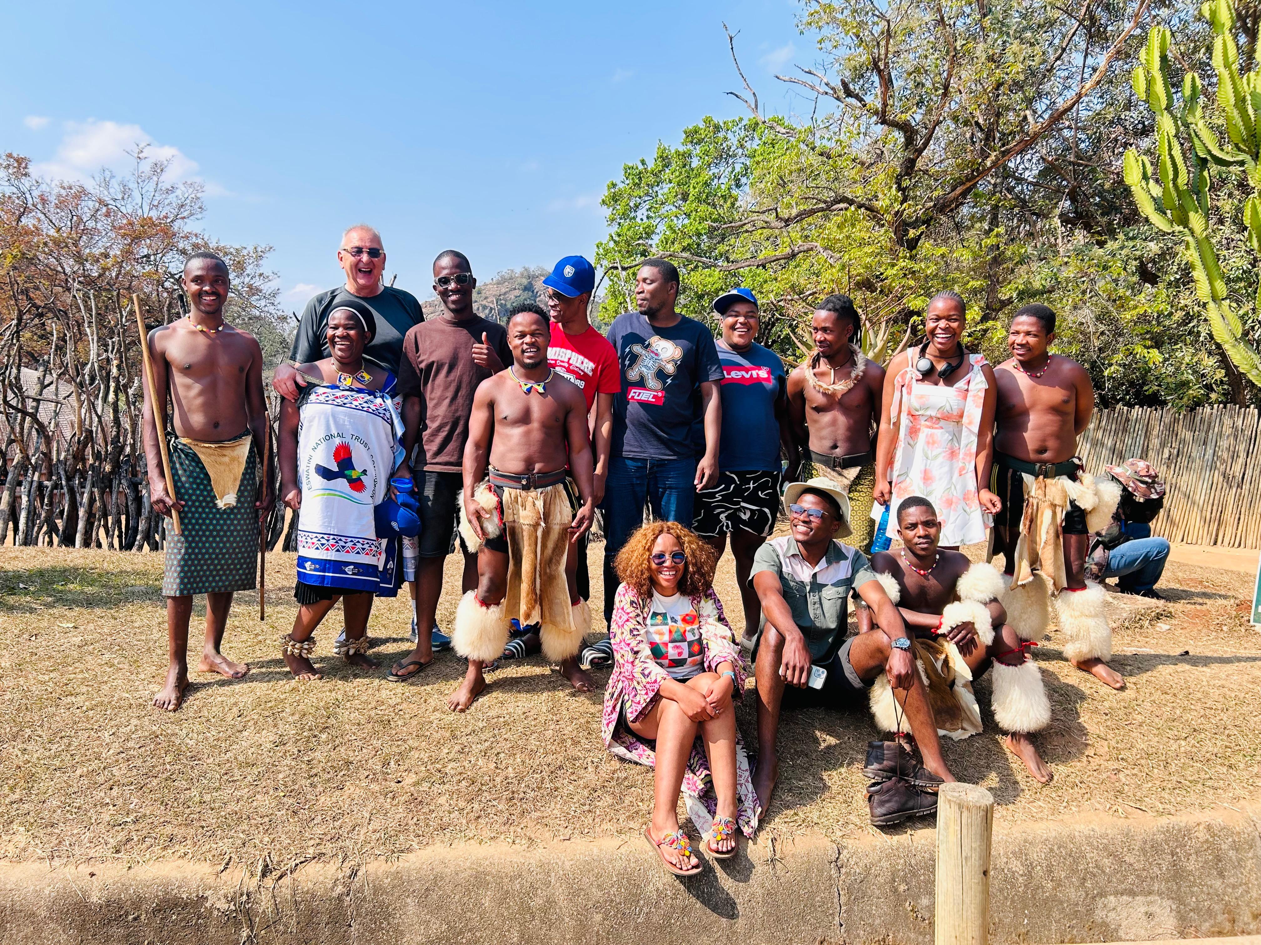 Students celebrating with completed robot